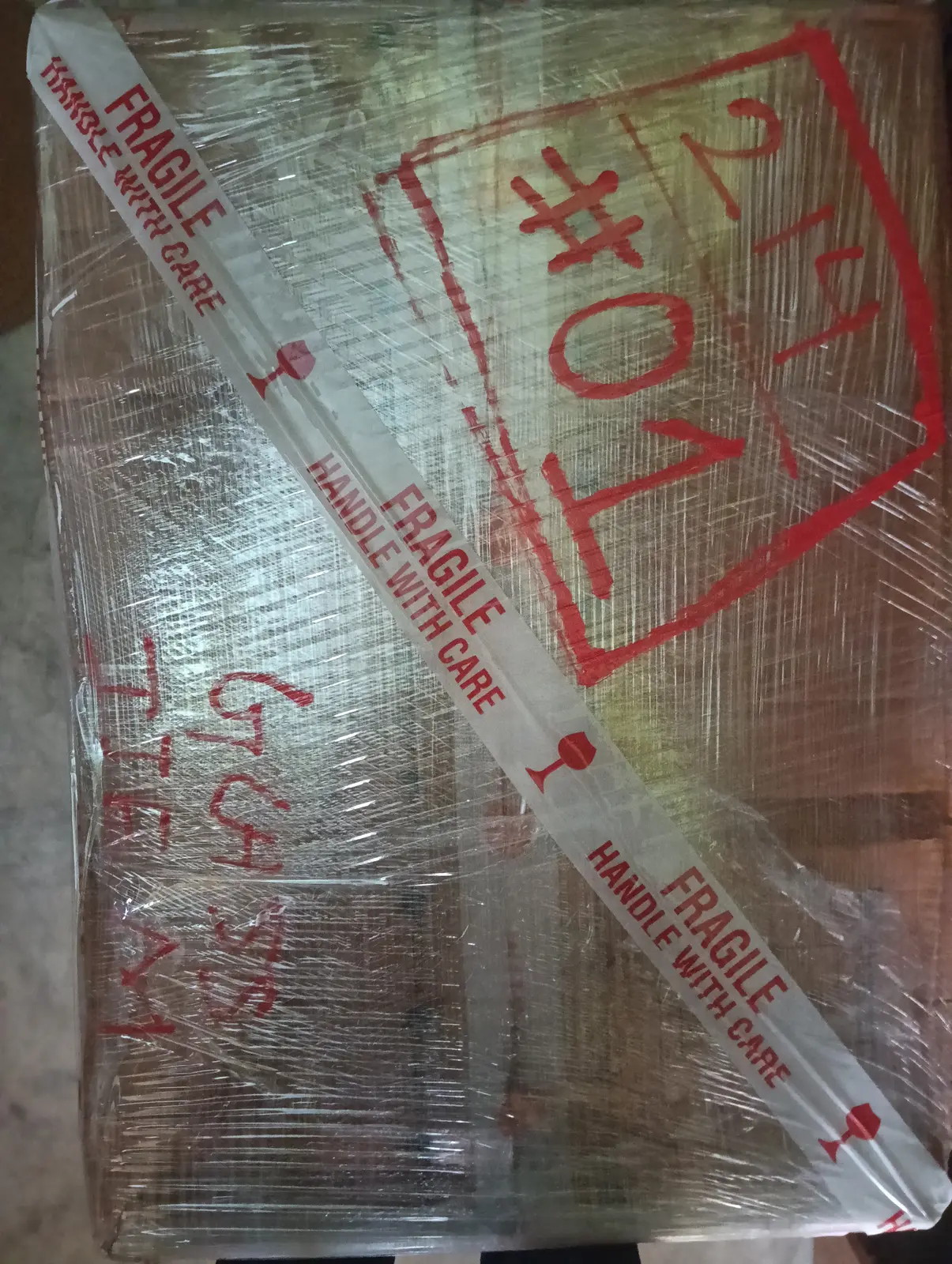 Fragile consignment with protective wrapping