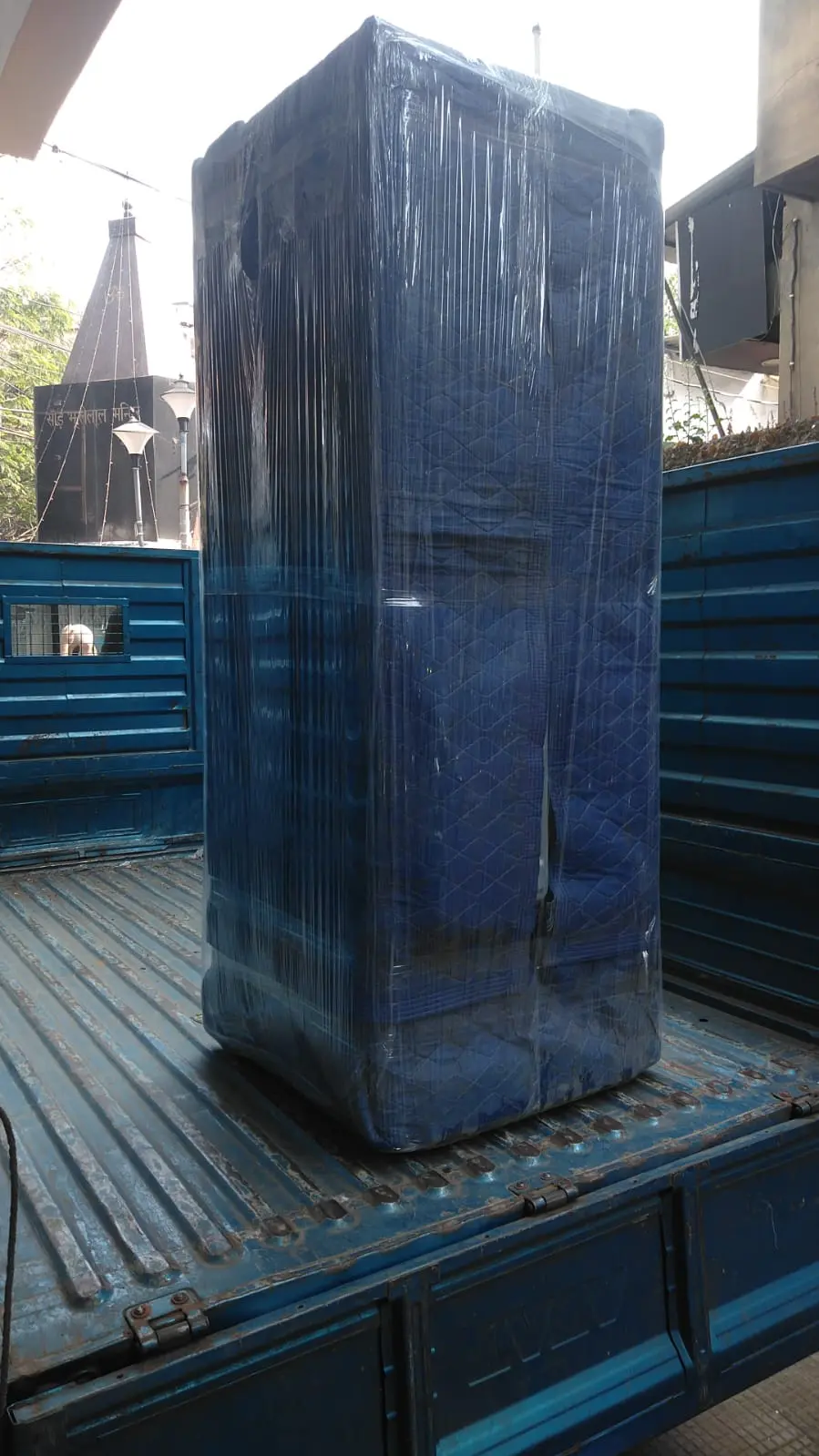 Large furniture with complete protective wrapping
